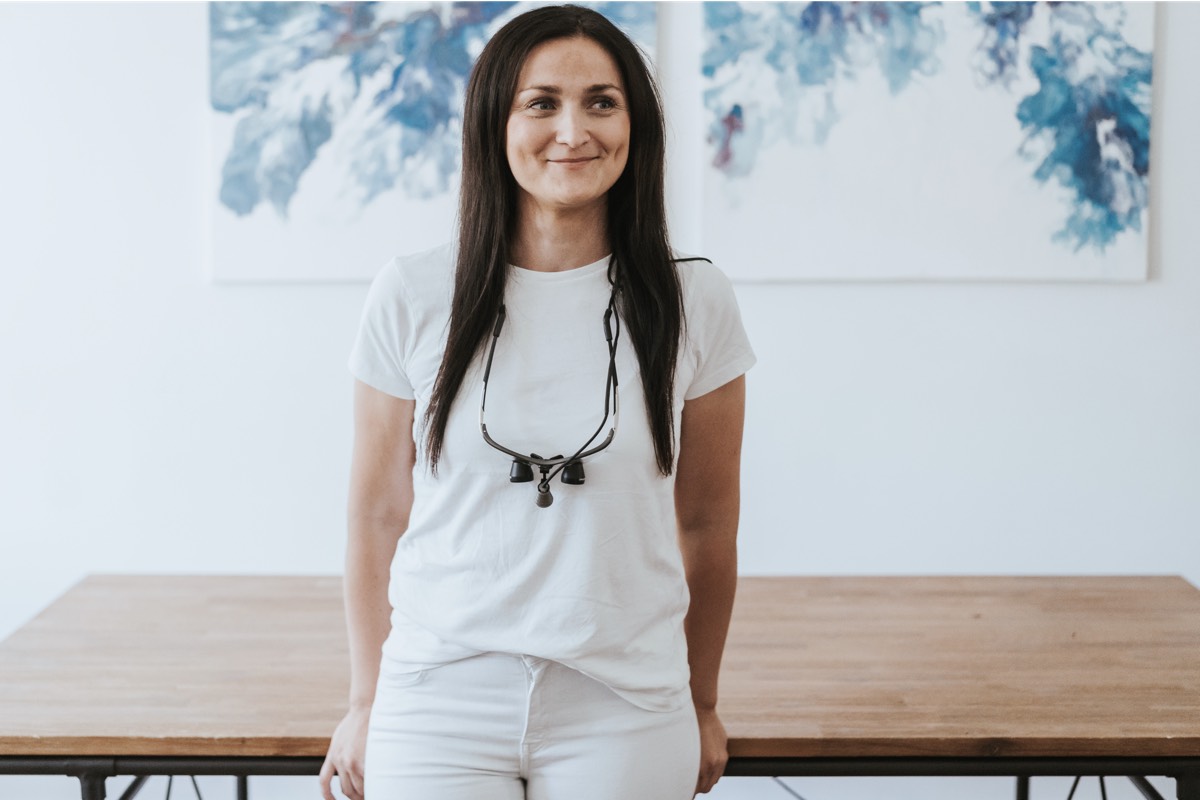 Barber 1 young man with beard smiling and wearing a brown shirt